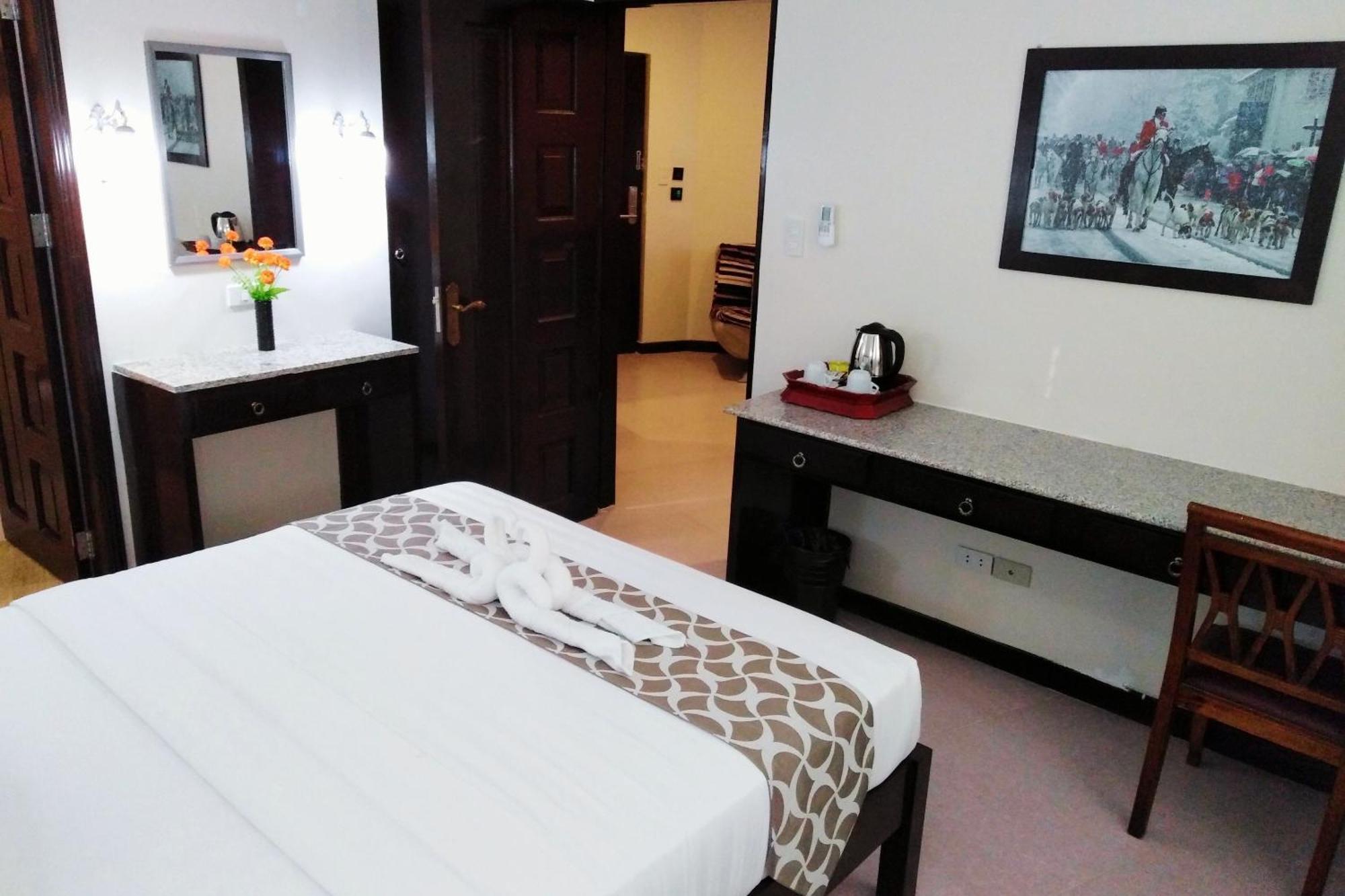 Venezia Suites Hotel Iloilo Habitación foto