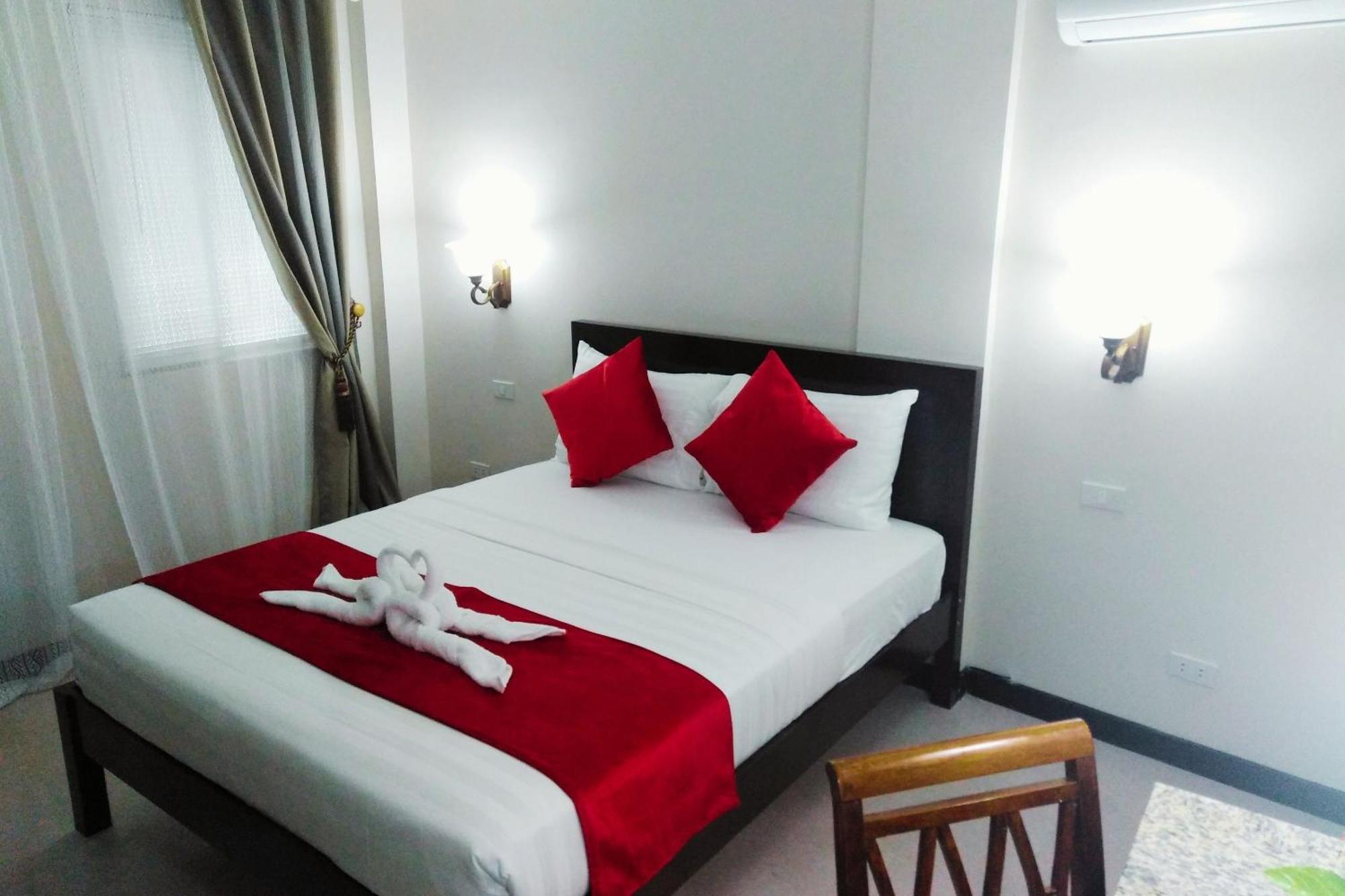Venezia Suites Hotel Iloilo Habitación foto