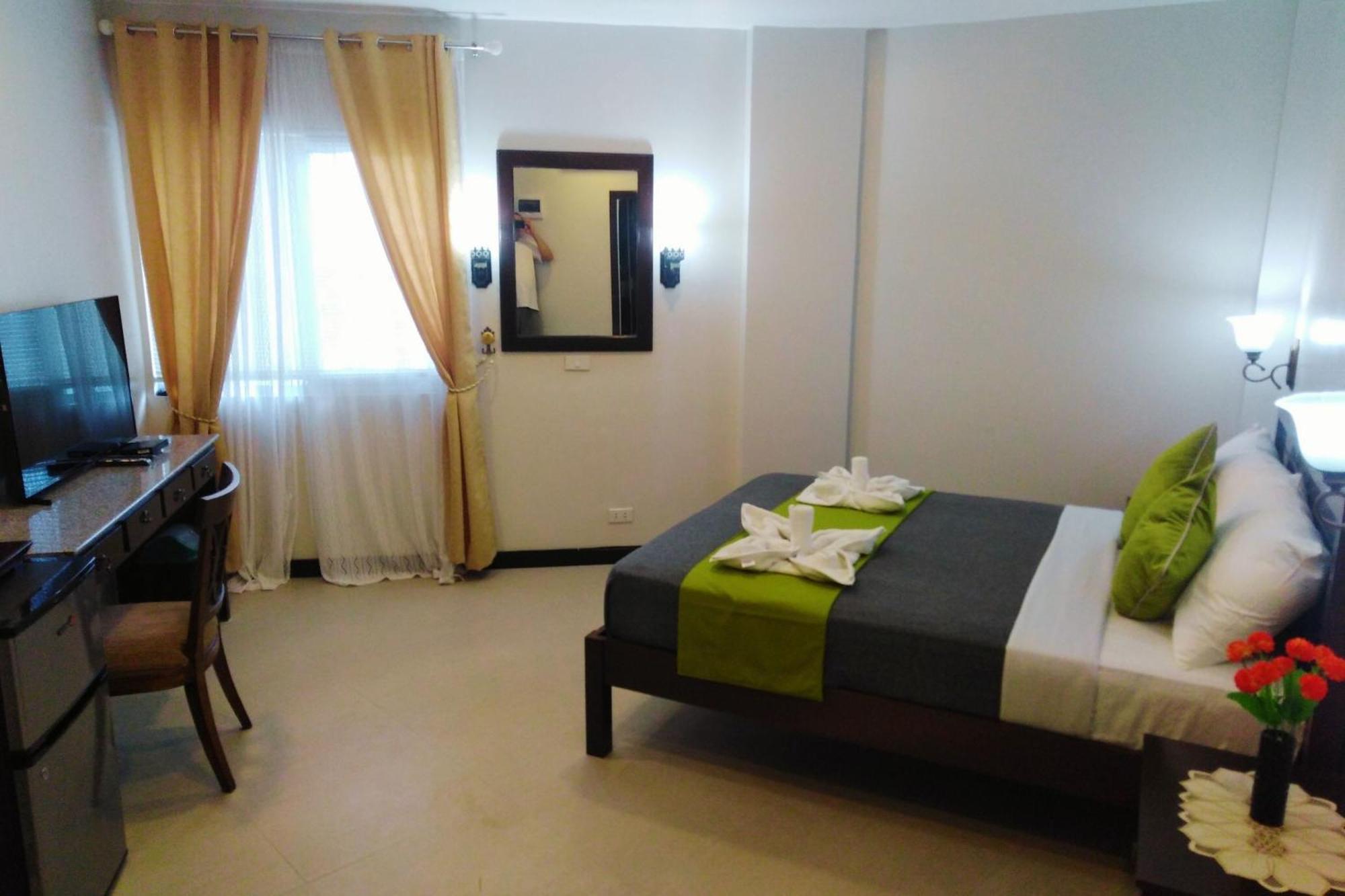 Venezia Suites Hotel Iloilo Habitación foto
